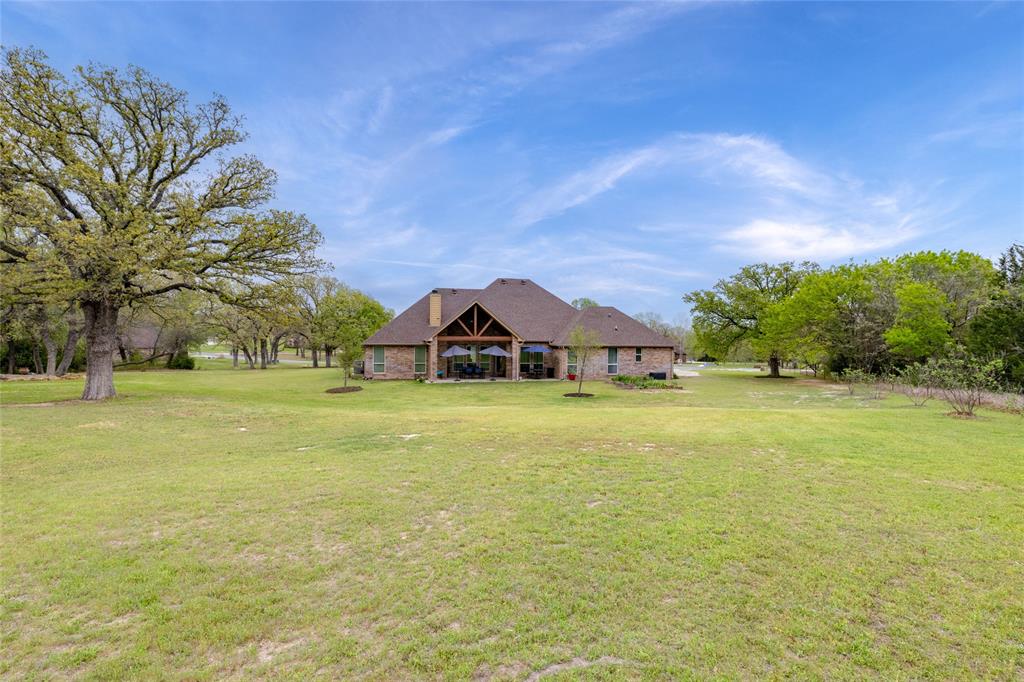 208 Ellis Creek Drive Weatherford, TX 76085 - Photo 36 of 40 a view of a house with a big yard