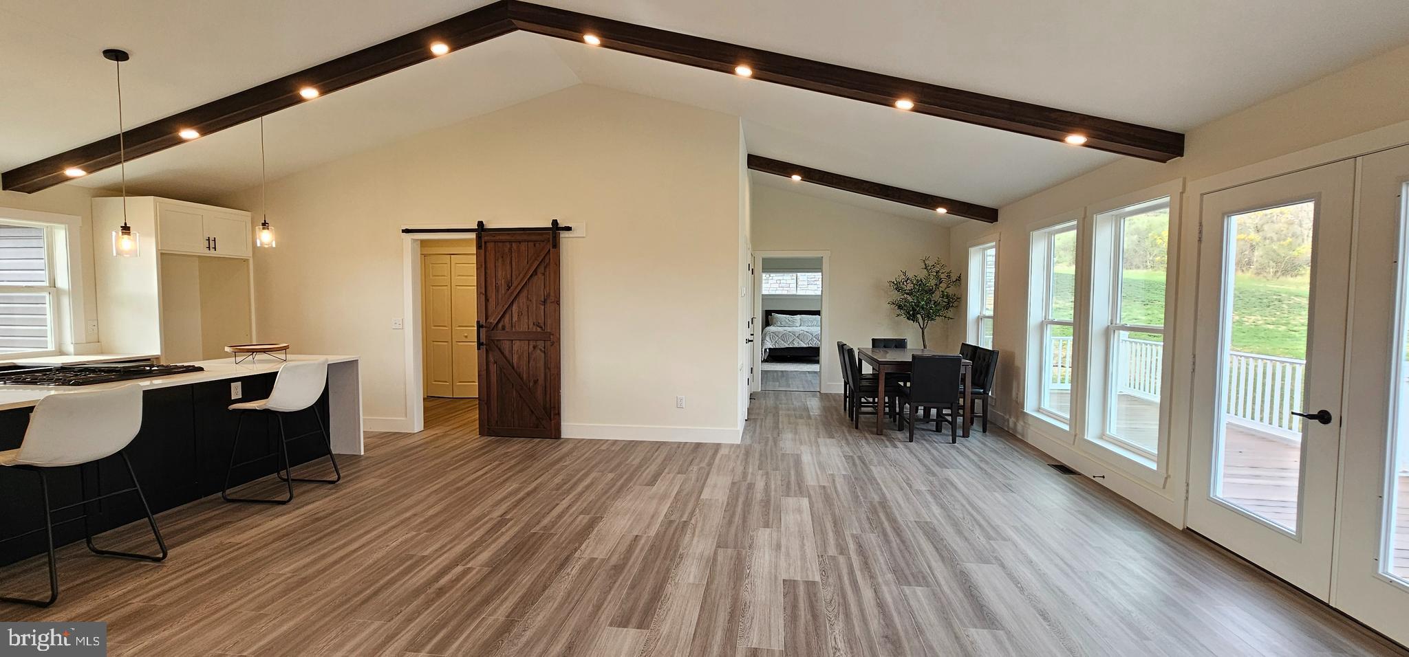 154 Saffron Boulevard Centre Hall, PA 16828 - Photo 22 of 57 a dining room with furniture and wooden floor