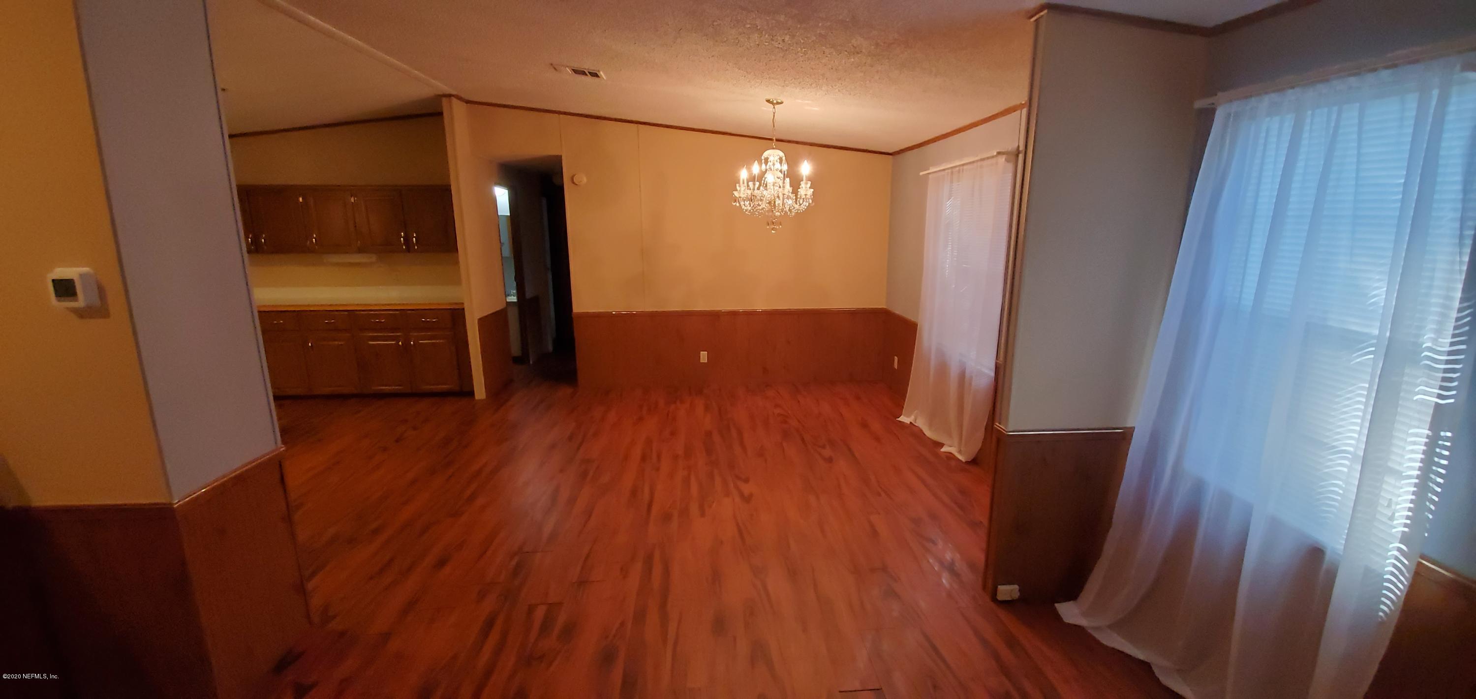 8917 Noroad, Unit 37 Jacksonville, FL 32210 - Photo 5 of 15 a view of gallery with wooden floor