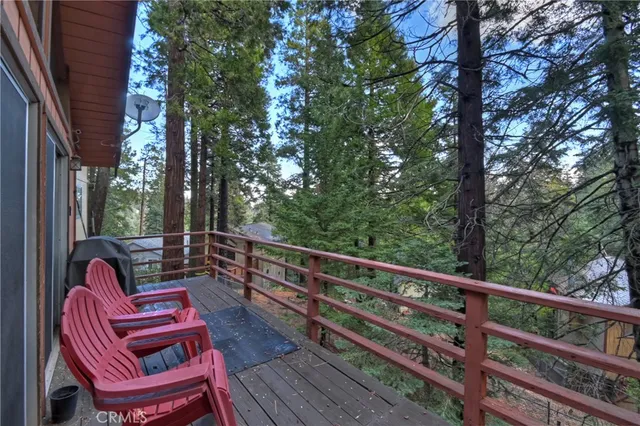 a view of a two chairs in the deck