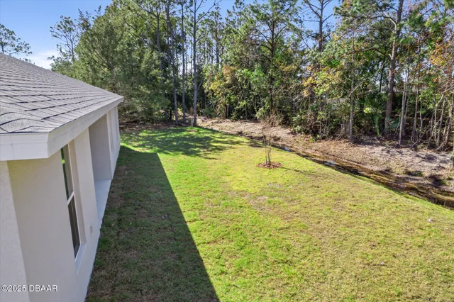 a swimming pool with wooden fence