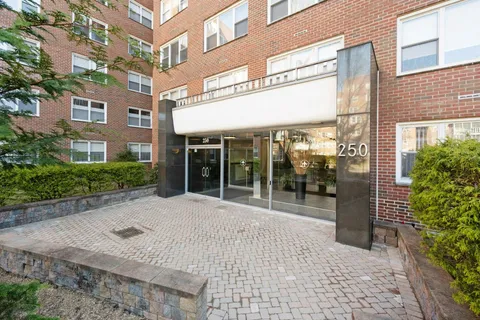 a view of a building with a garden