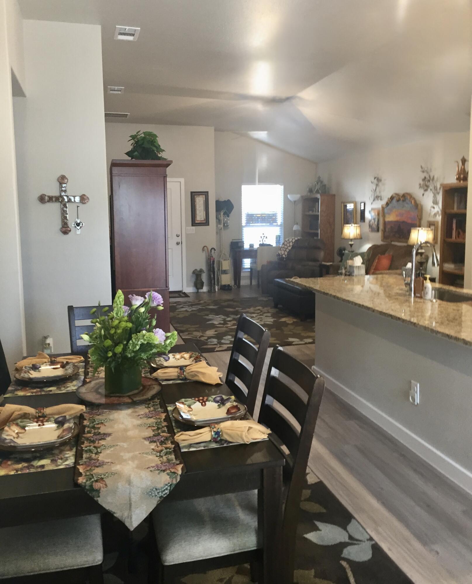 3219 Volney Avenue Lubbock, TX 79407 - Photo 2 of 10 Dining - Living Room 3219 Volney Ave
