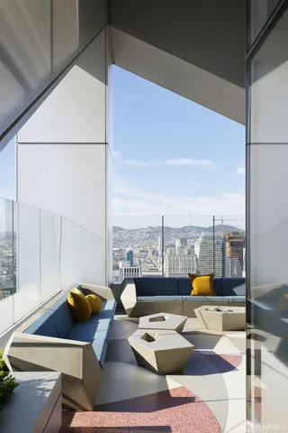 a view of a workspace with a couch