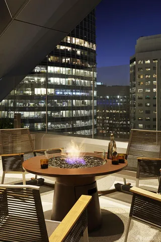 a picture of a table and chairs in the terrace