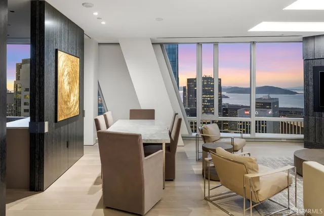 a view of a living room with a large window