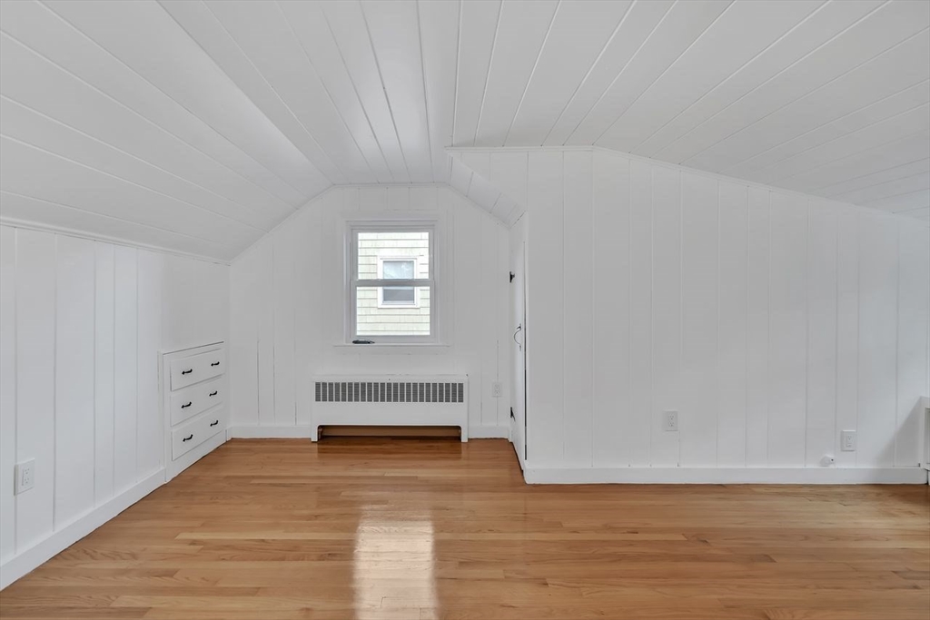 46 Middle Street Lexington, MA 02421 - Photo 21 of 33 a view of a room with wooden floor and window