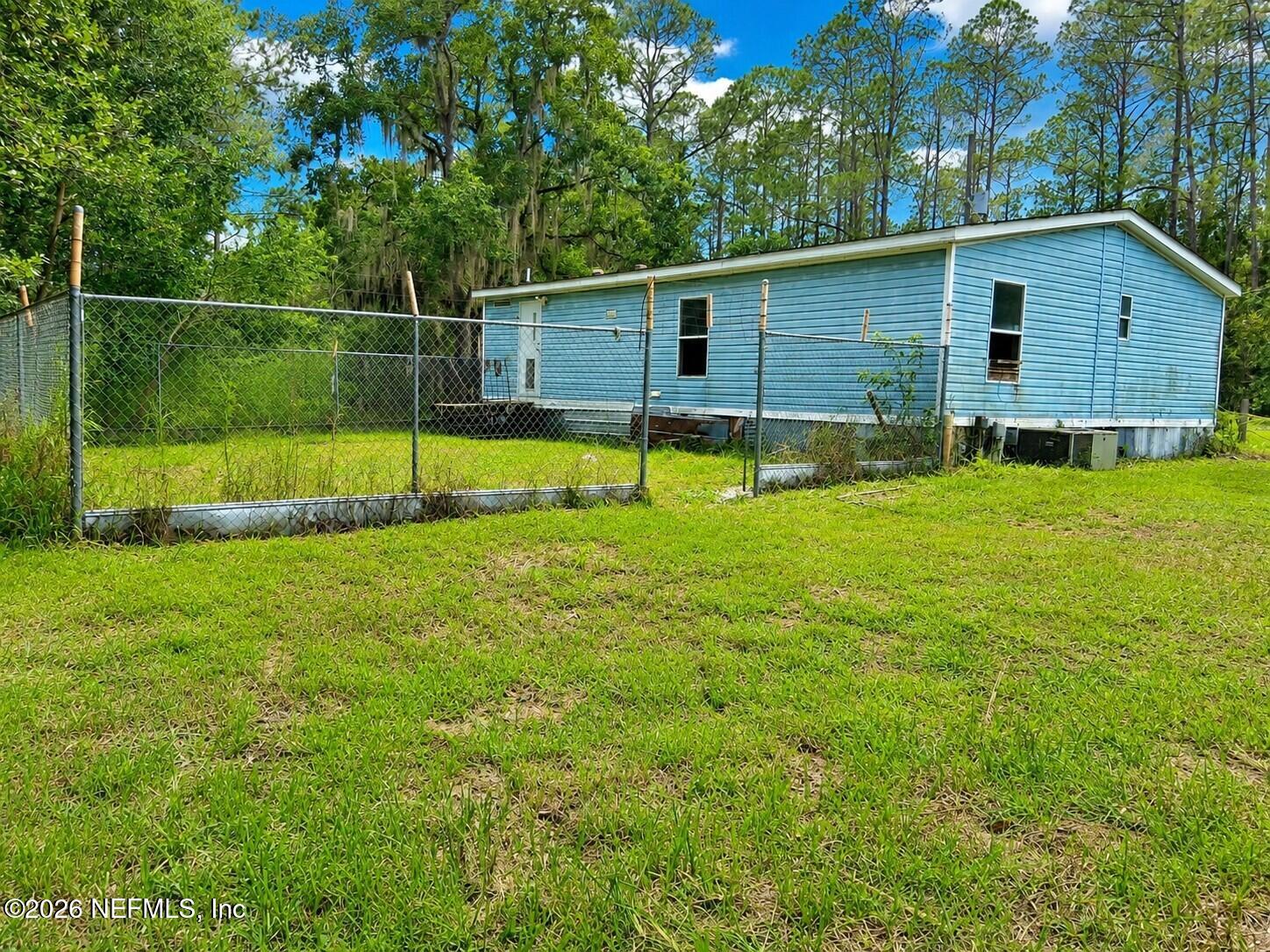106 Lake Shore Road Interlachen, FL 32148 - Photo 2 of 19 Back