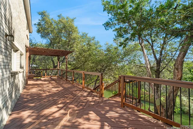 a view of a chairs and tables in the balcony