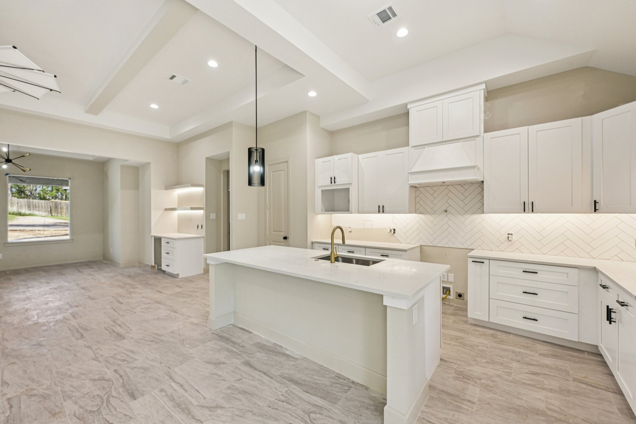 15132 Coaltown Road Willis, TX 77378 - Photo 13 of 30 a kitchen with a sink stove and cabinets