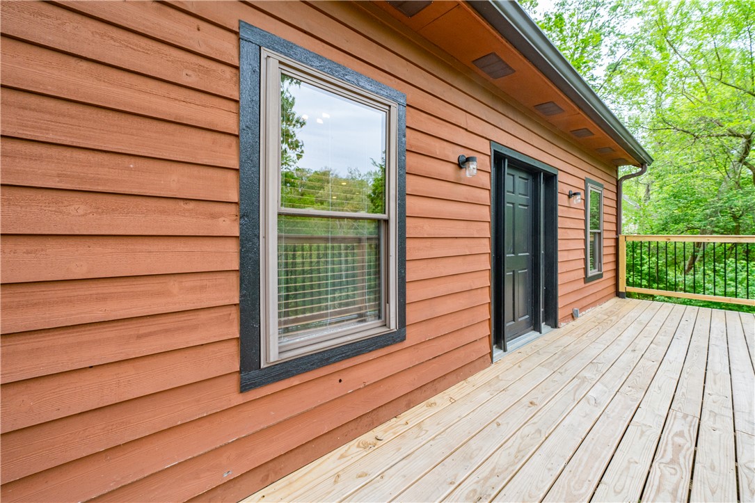 10584 New Biddinger Road Harrison, OH 45030 - Photo 45 of 61 This charming property features durable wood siding and a spacious deck, perfect for outdoor enjoyment.