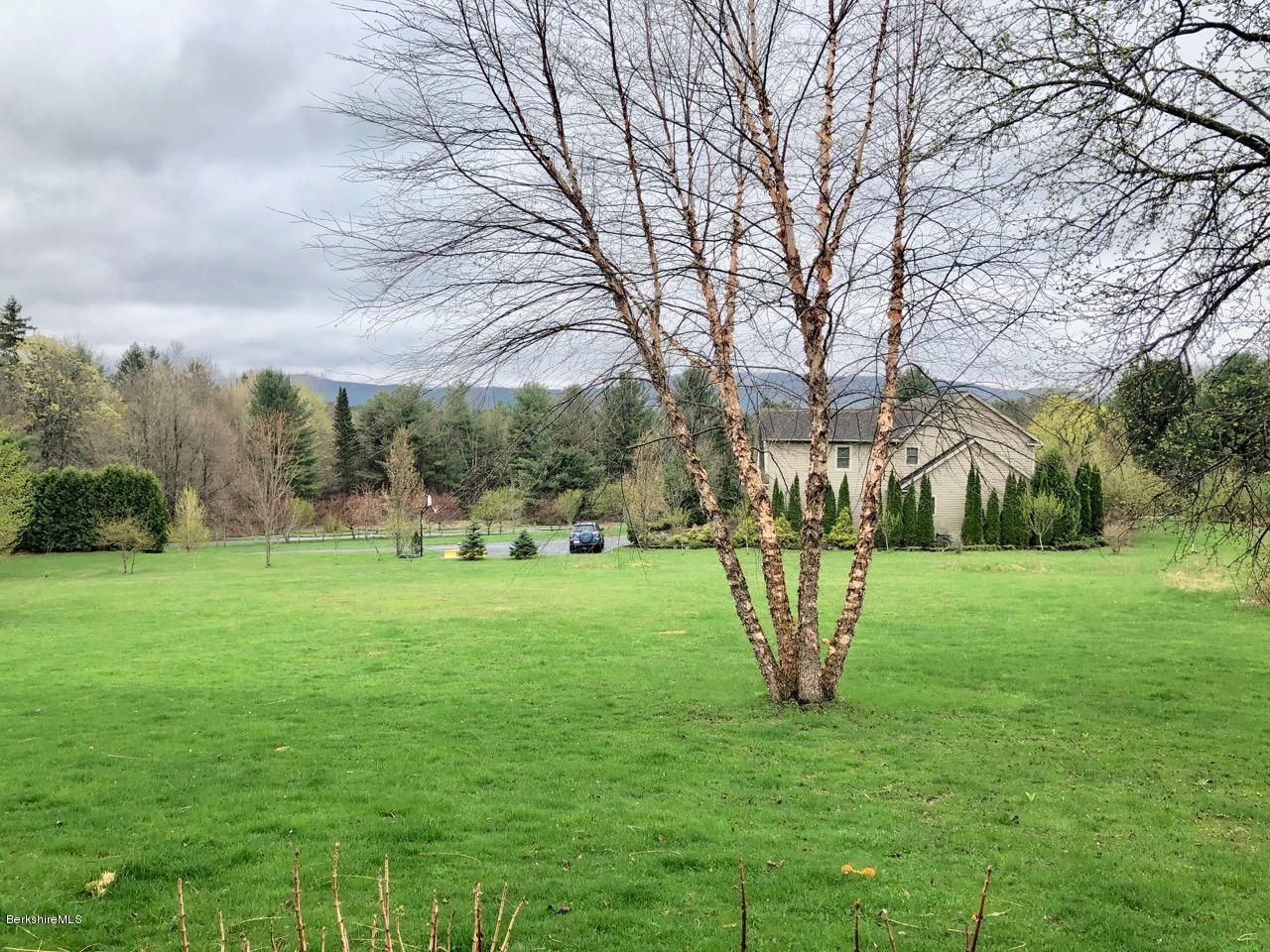 385 W Road Lee, MA 01238 - Photo 3 of 35 a view of a park with large trees