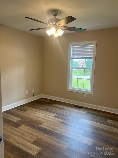 142 Dove Meadow Lane Statesville, NC 28625 - Photo 4 of 9 a view of an empty room with wooden floor and a window