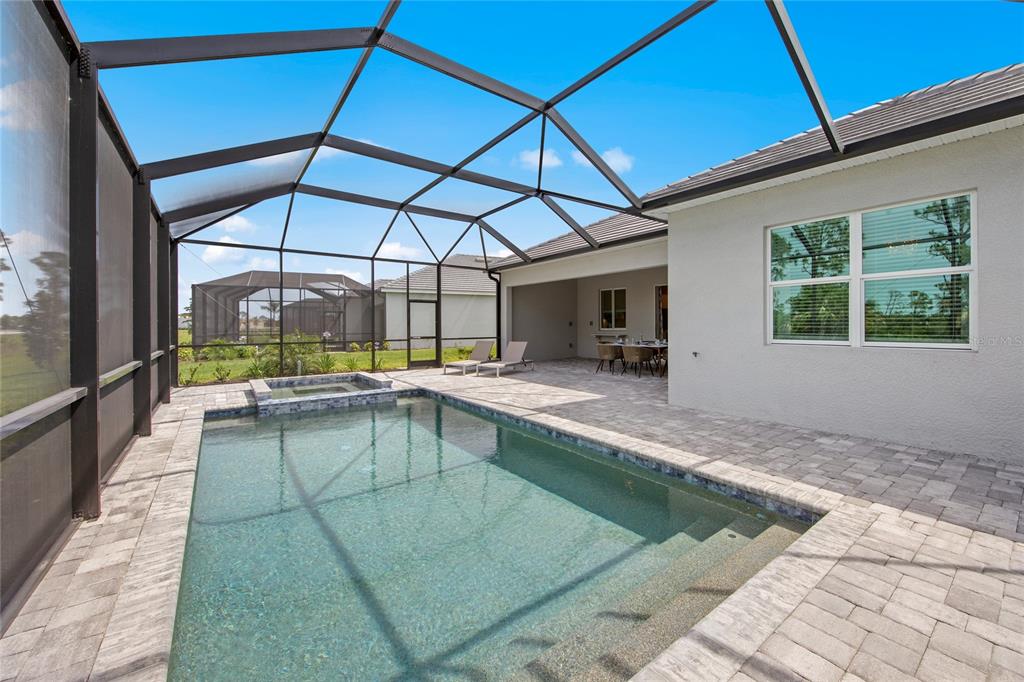 7161 Inlet Isles Lakewood Ranch, FL 34202 - Photo 28 of 29 a view of a backyard of a house