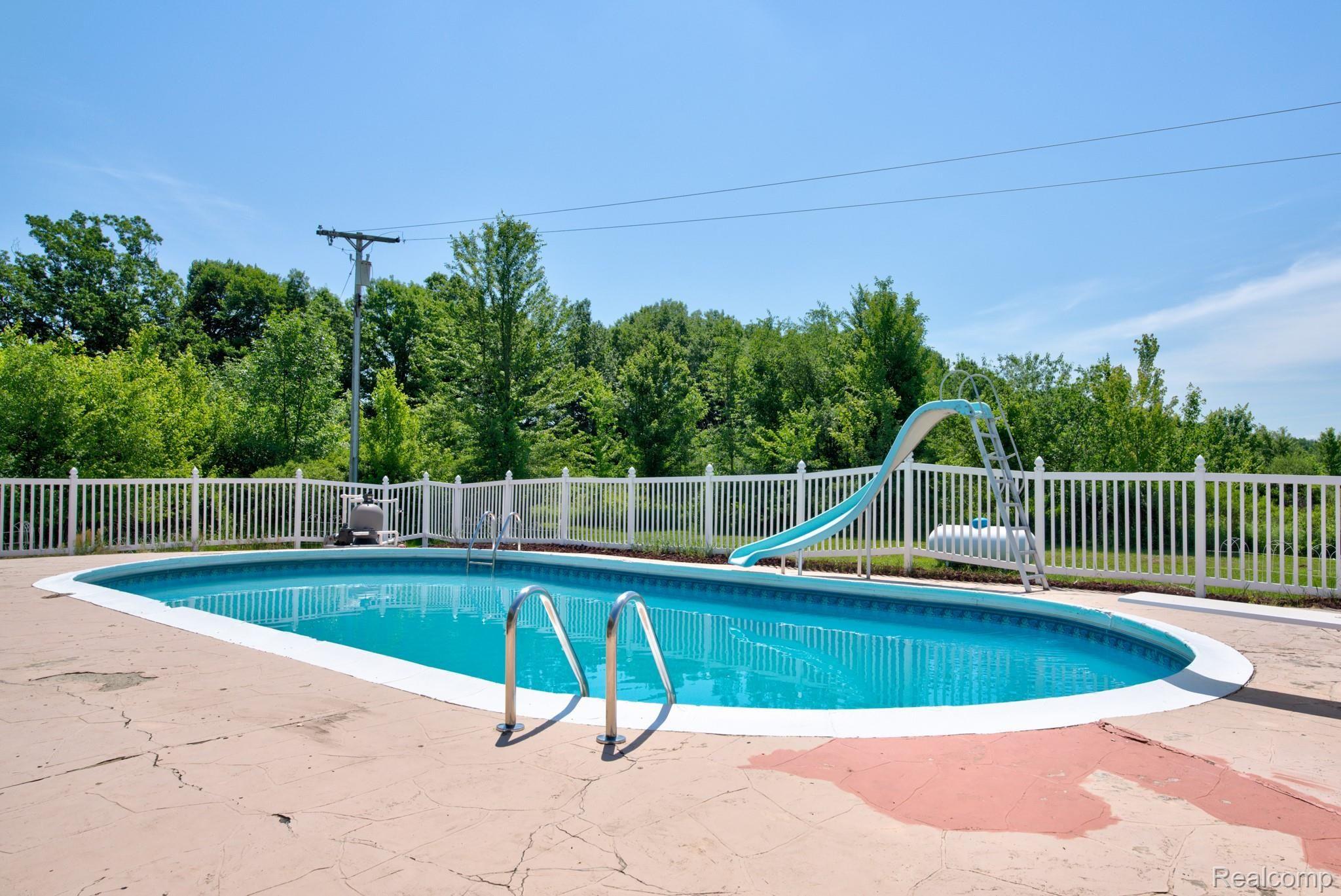 10575 West Sober Road Webberville, MI 48892 - Photo 36 of 46 POOL IS ENTIRELY FENCED IN