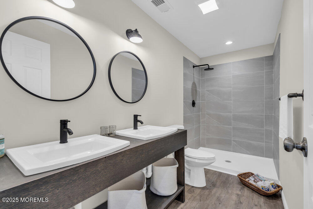393 North County Line Road Jackson, NJ 08527 - Photo 19 of 21 a bathroom with a sink and a mirror