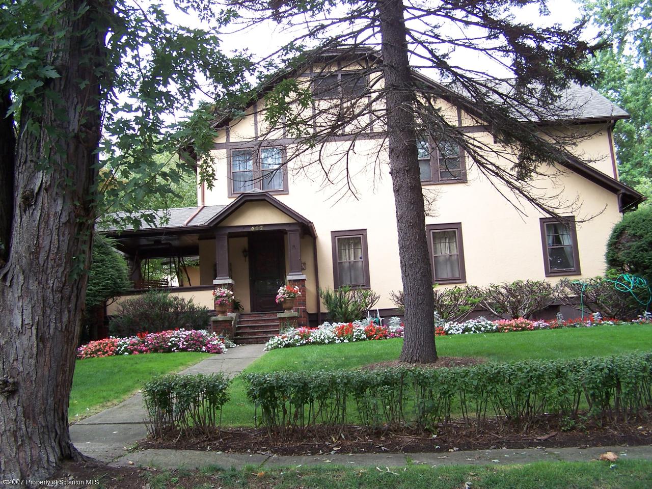 407 Nelson Street Clarks Summit, PA 18411 - Photo 3 of 3 a front view of a house with garden