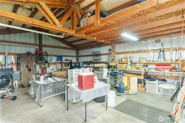 a room with lots of furniture and clutter