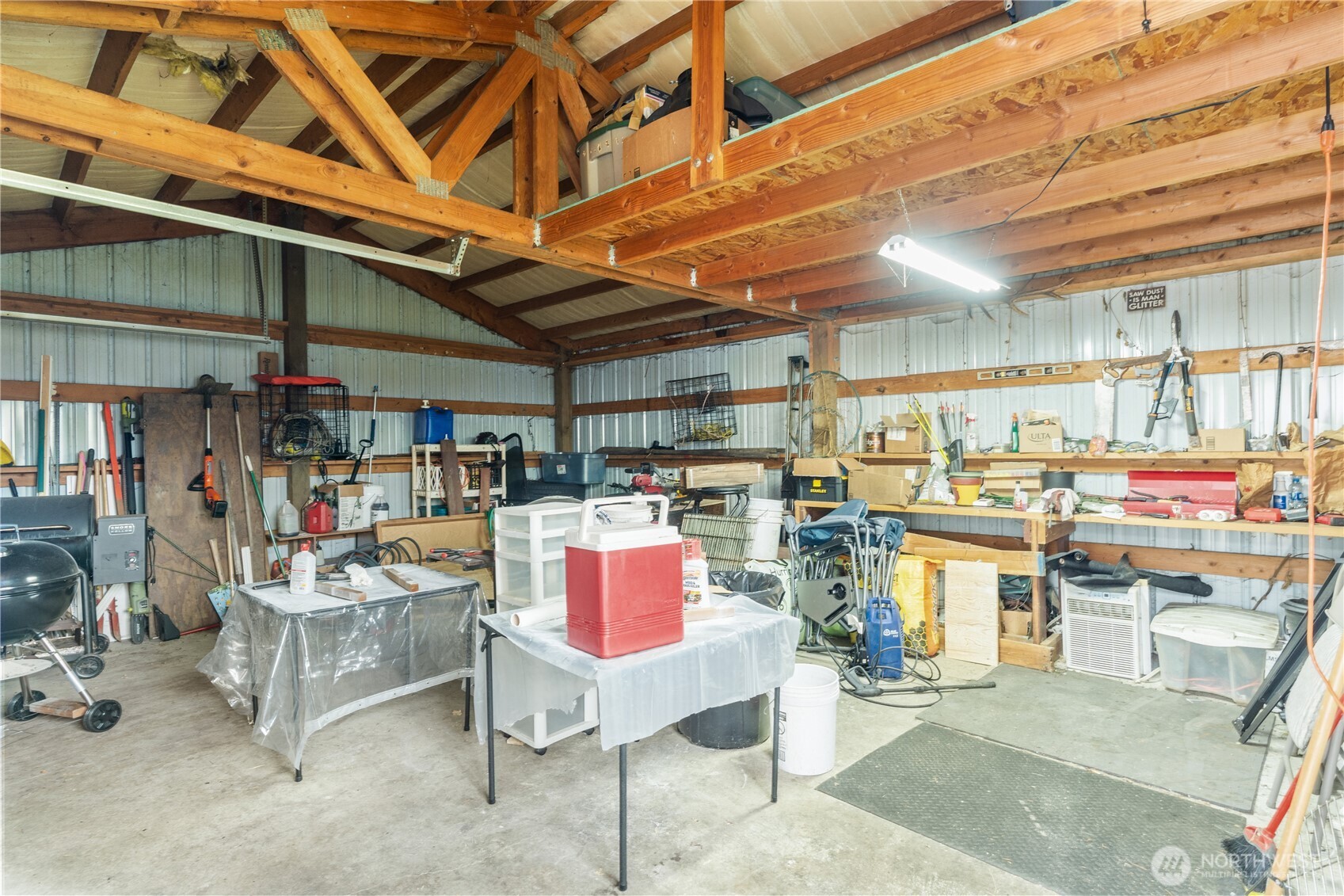 1614 West Martin Street Elma, WA 98541 - Photo 25 of 38 a room with lots of furniture and clutter