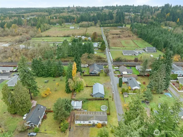 an aerial view of residential house with outdoor space