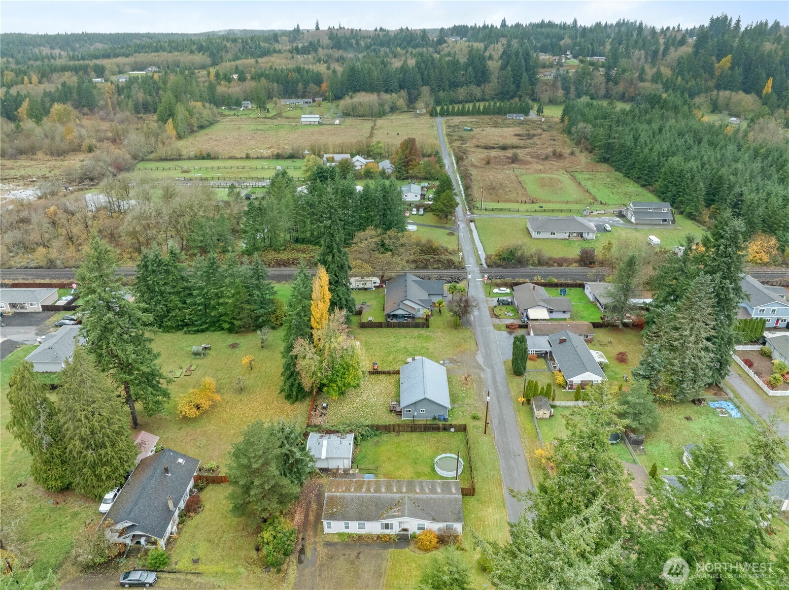 1614 West Martin Street Elma, WA 98541 - Photo 33 of 38 an aerial view of residential house with outdoor space
