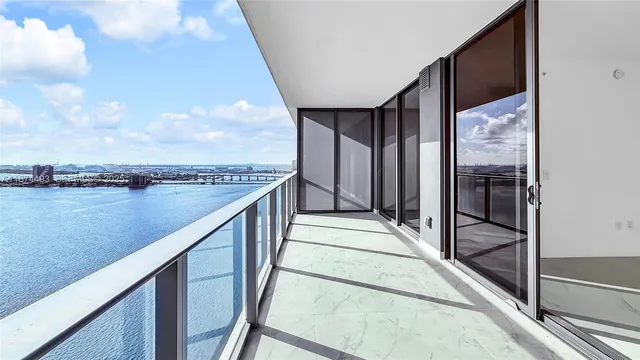 a view of a city with tall buildings in front of it