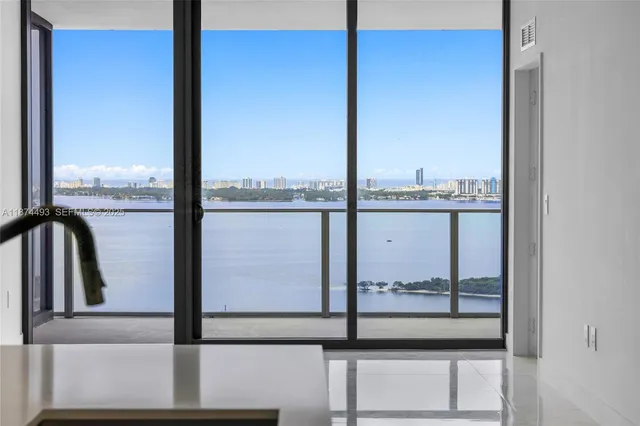 a view of a room with white walls