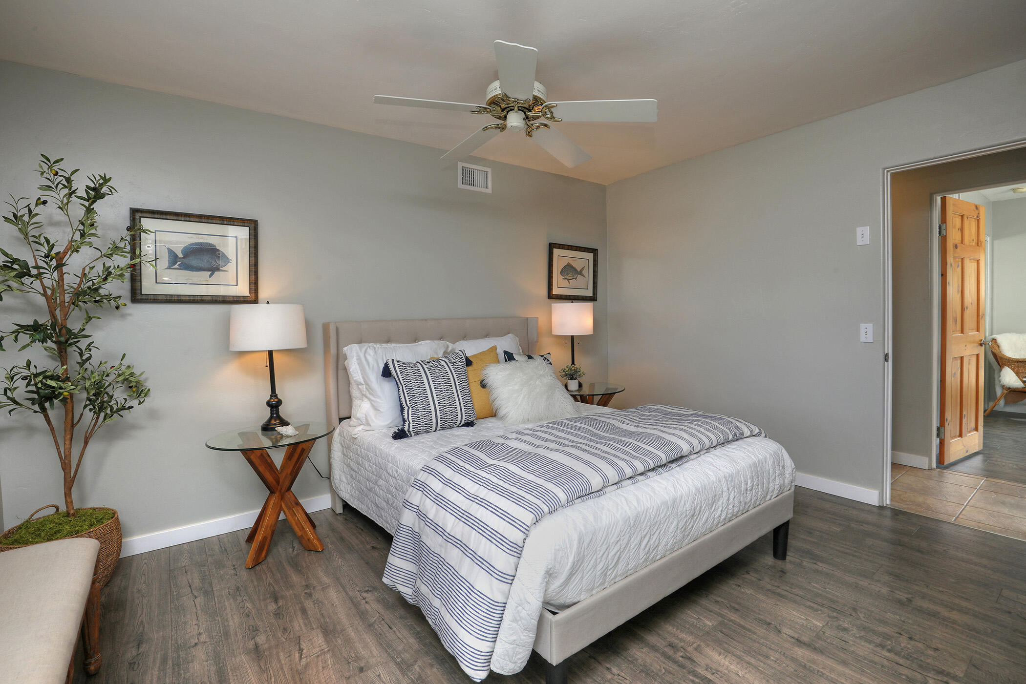 570 Amherst Drive Goleta, CA 93117 - Photo 18 of 31 a bedroom with a bed and a chandelier