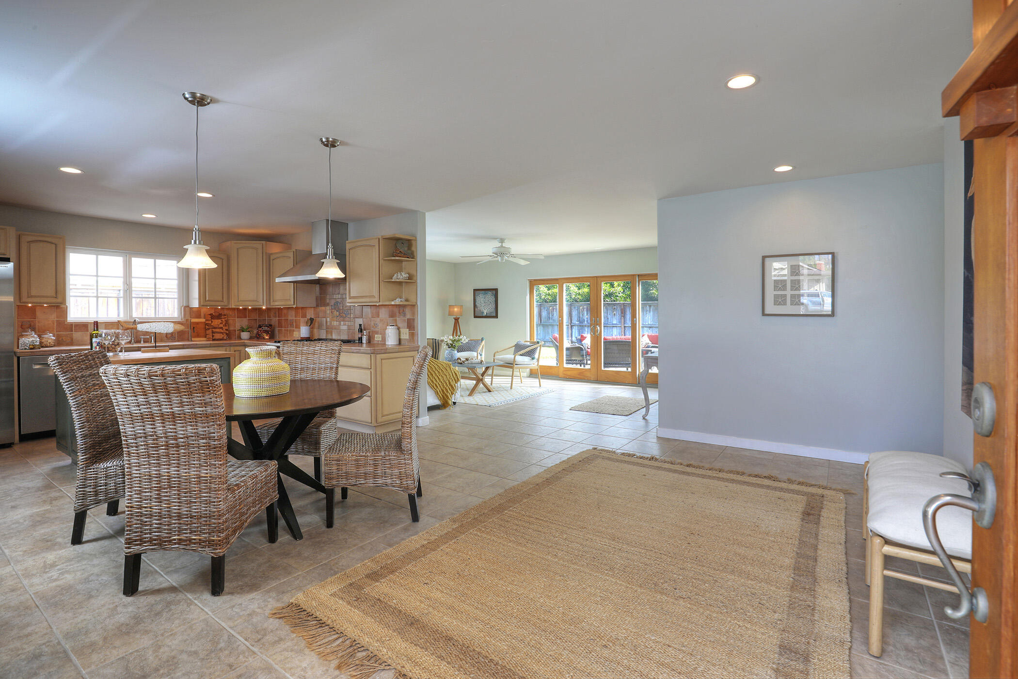 570 Amherst Drive Goleta, CA 93117 - Photo 4 of 31 an open kitchen with dining table and chairs