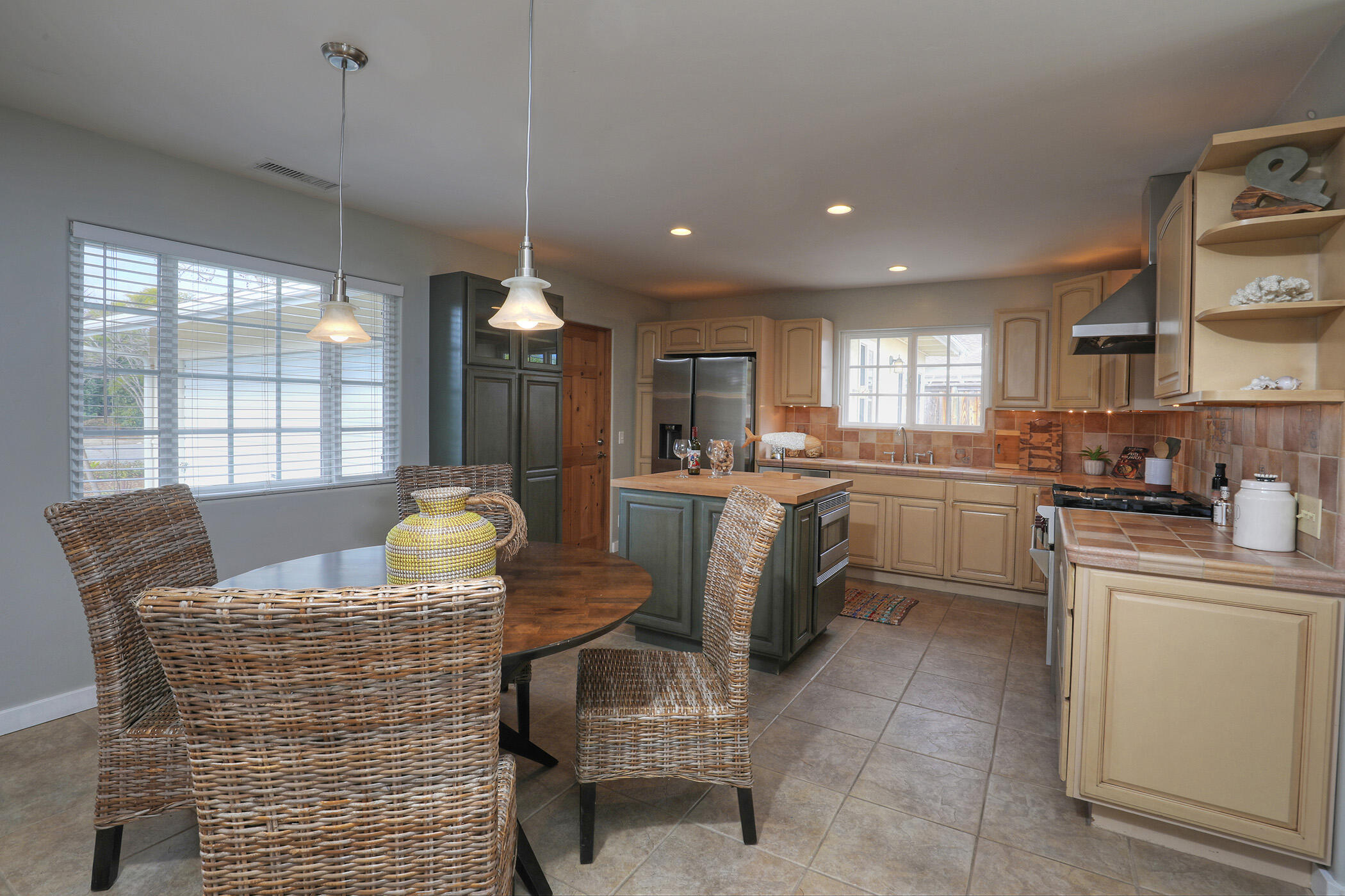 570 Amherst Drive Goleta, CA 93117 - Photo 6 of 31 a living room with furniture a window and kitchen view