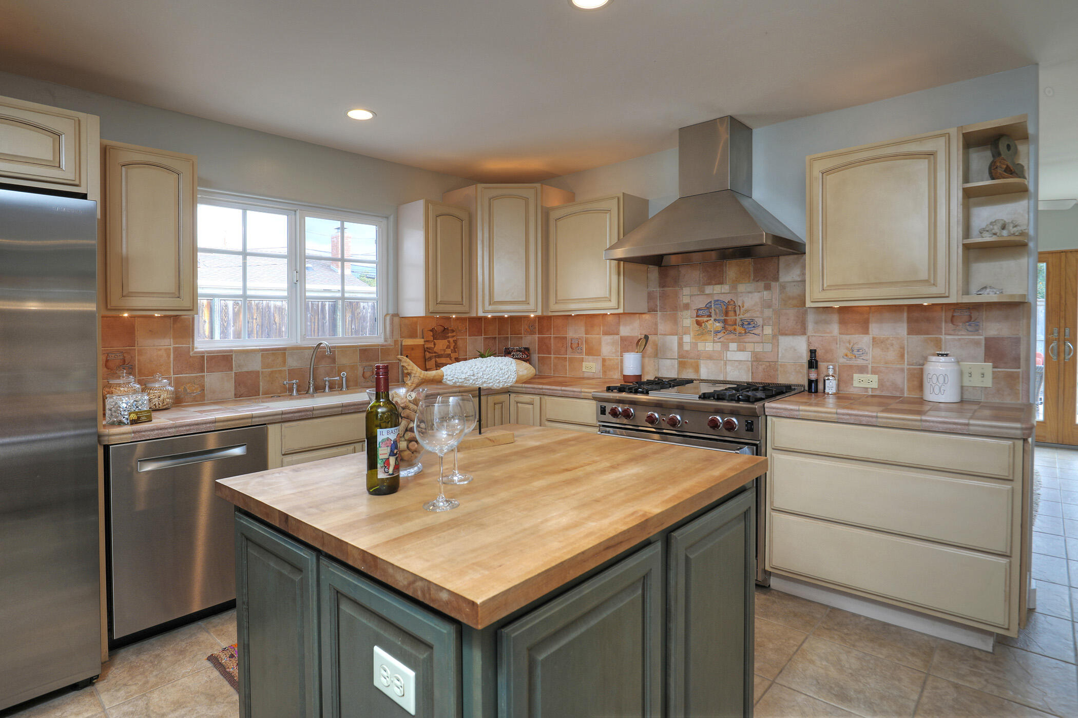 570 Amherst Drive Goleta, CA 93117 - Photo 7 of 31 a kitchen with a sink stove and cabinets