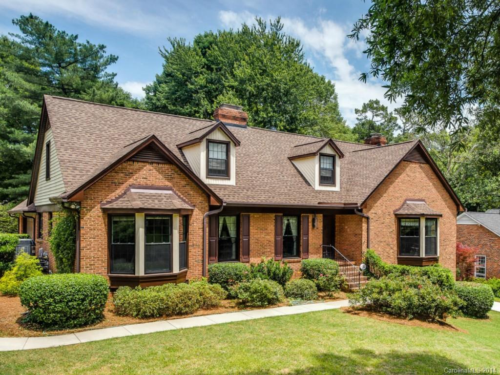409 Whitestone Road Charlotte, NC 28270 - Photo 1 of 18 a front view of a house with a yard