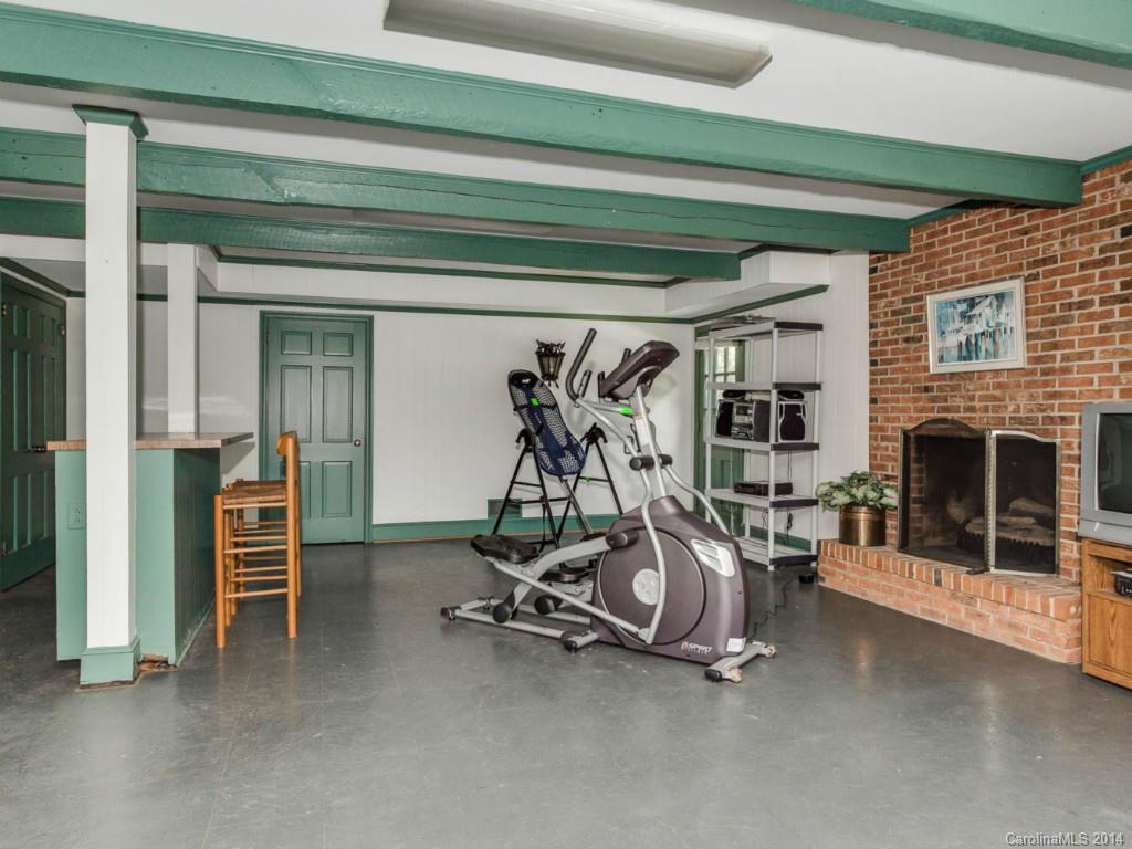 409 Whitestone Road Charlotte, NC 28270 - Photo 15 of 18 a view of a room with gym equipment