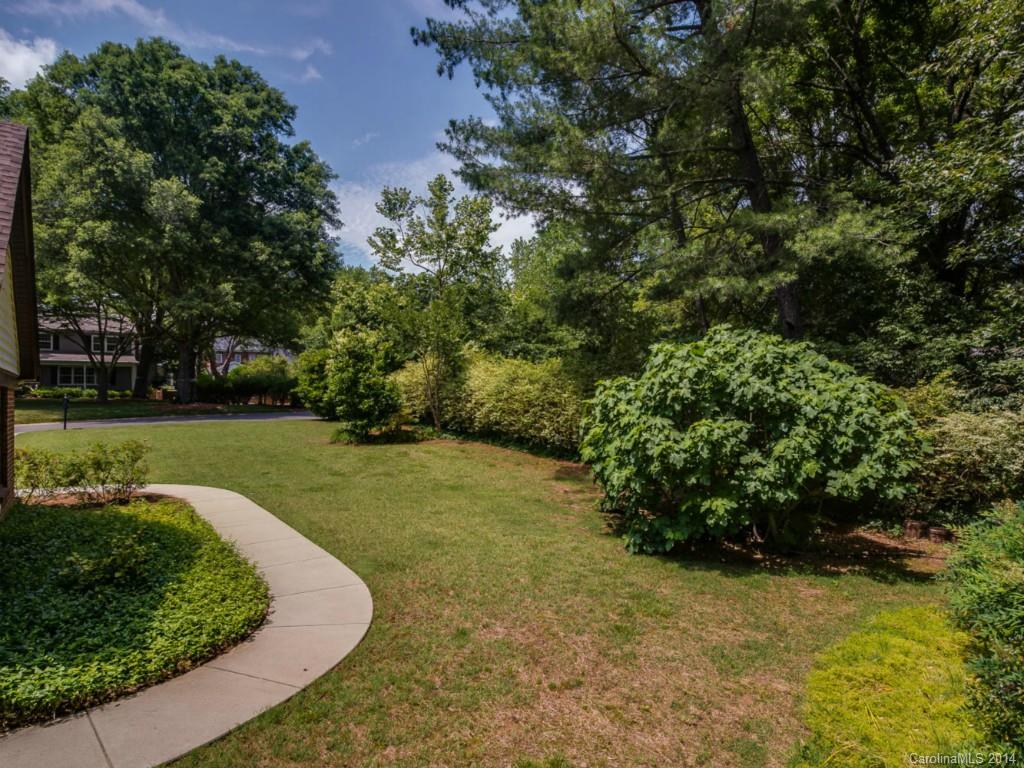 409 Whitestone Road Charlotte, NC 28270 - Photo 18 of 18 a view of a golf course with a garden