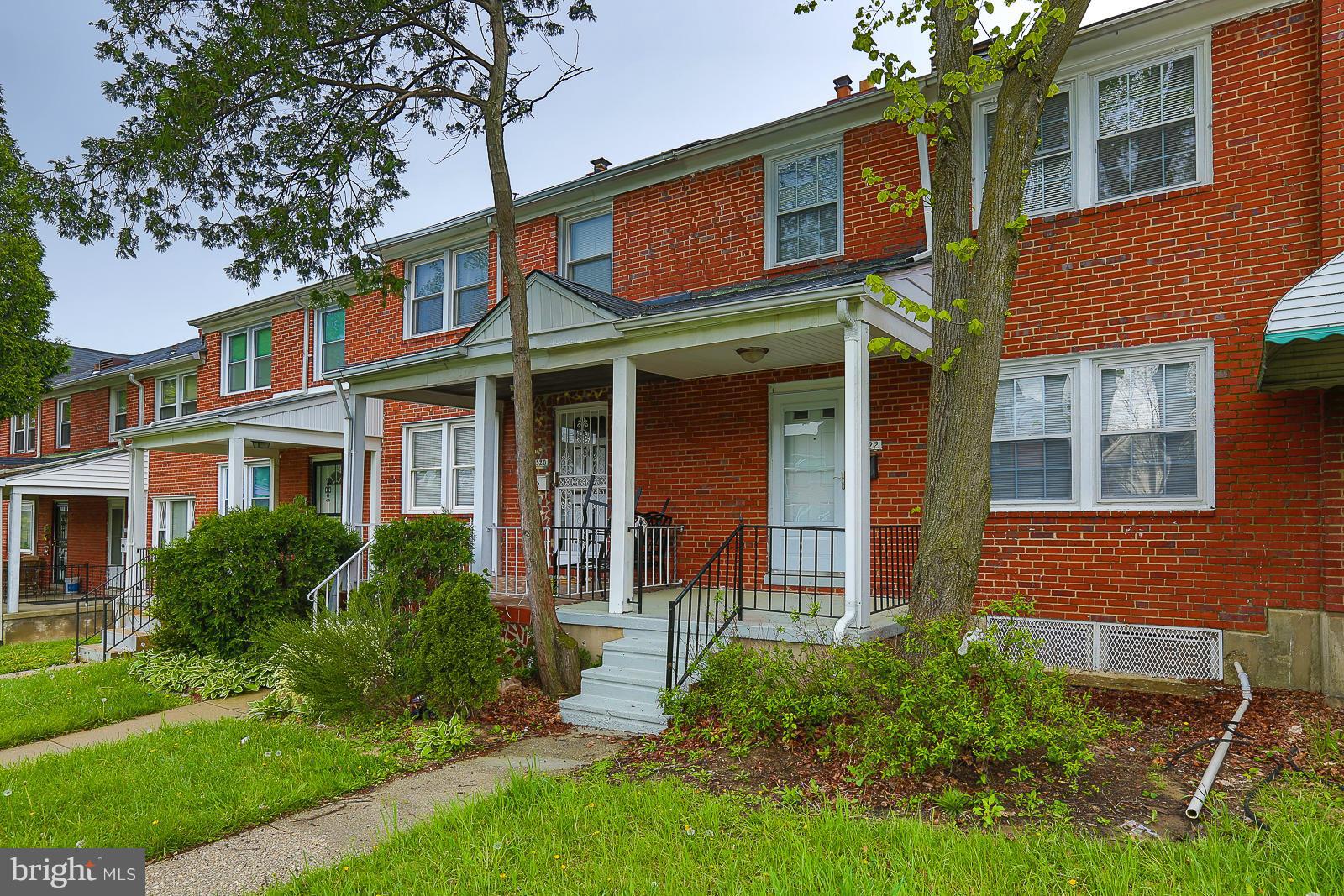 4522 Marble Hall Road Baltimore, MD 21239 - Photo 3 of 28 a front view of a house having yard