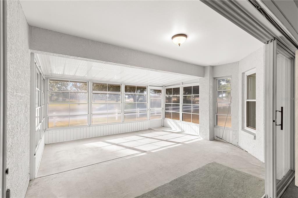 9614 Southwest 93rd Loop Ocala, FL 34481 - Photo 16 of 45 a view of an empty room with a window