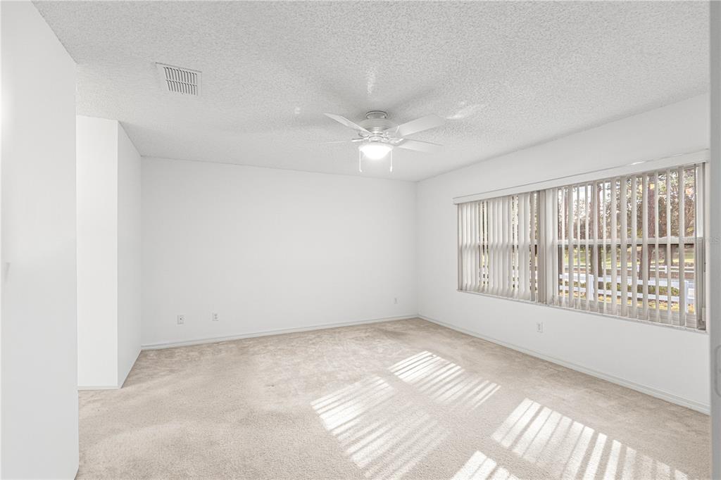 9614 Southwest 93rd Loop Ocala, FL 34481 - Photo 25 of 45 a view of an empty room with a window