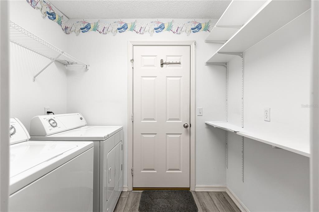 9614 Southwest 93rd Loop Ocala, FL 34481 - Photo 37 of 45 a view of utility room with washer and dryer