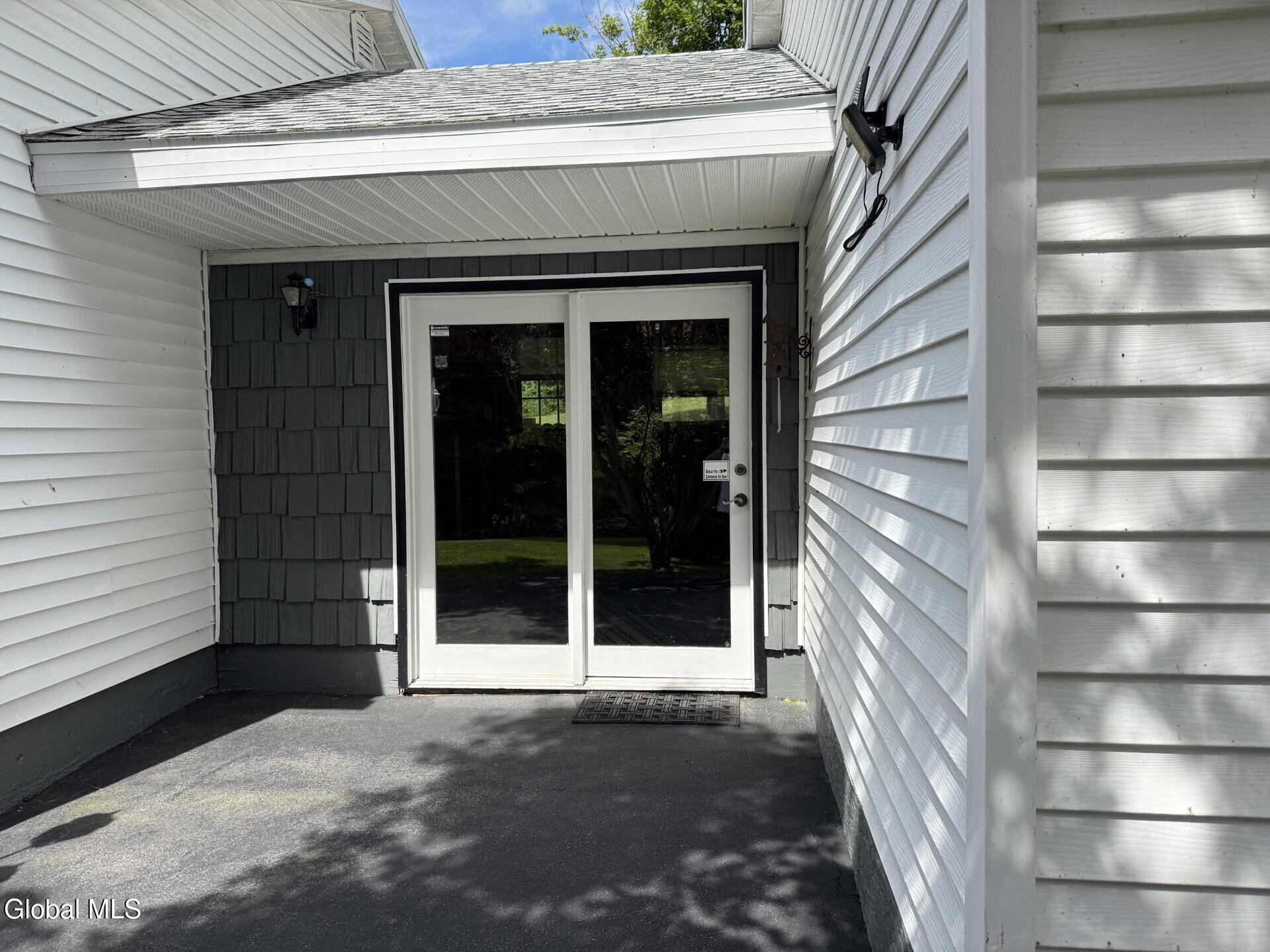 695 Dean Road Hudson Falls, NY 12839 - Photo 4 of 35 breezeway/sunroon