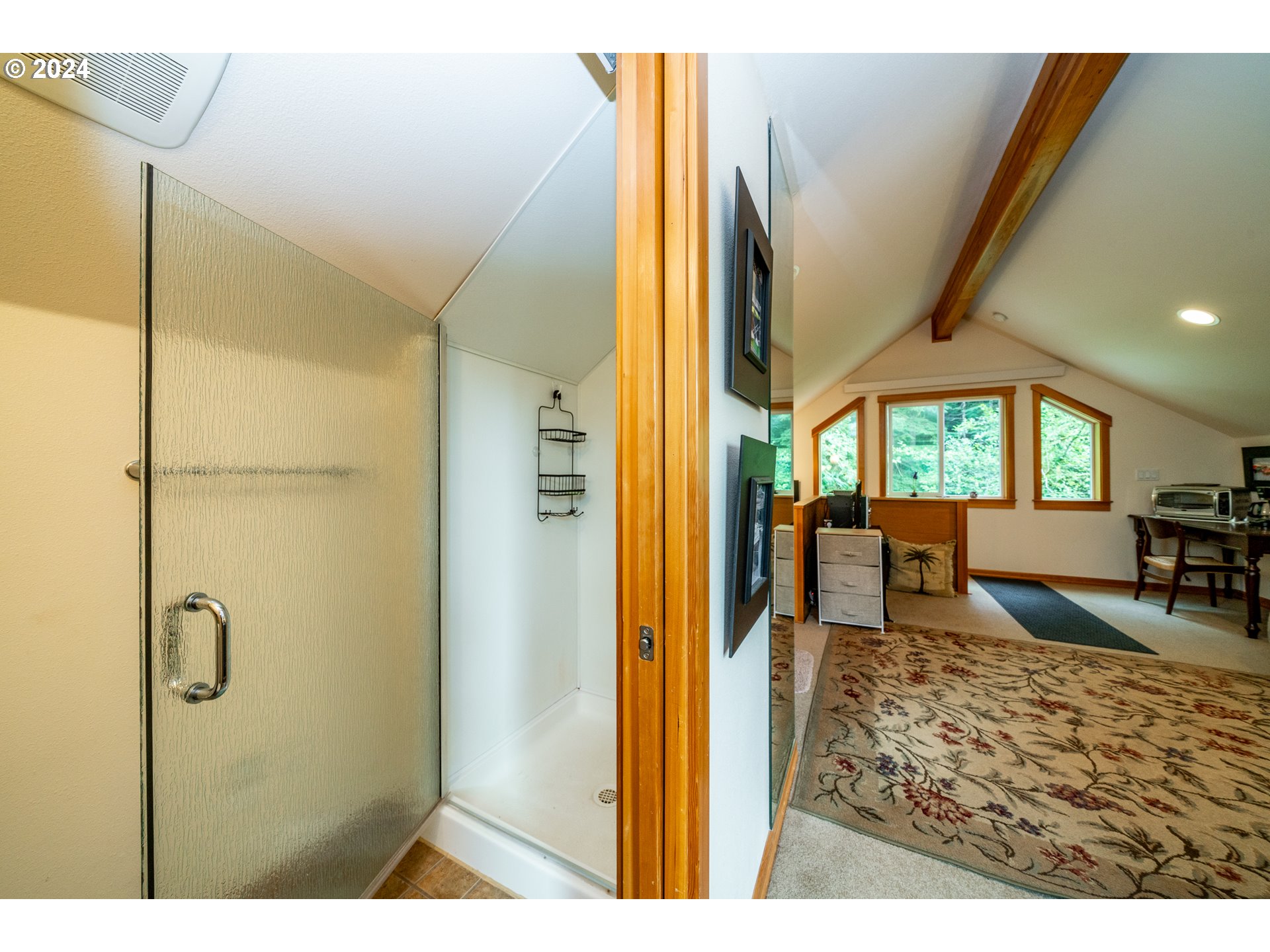 9355 Dewolf Road Nehalem, OR 97131 - Photo 28 of 33 a view of a livingroom with furniture wooden floor and window