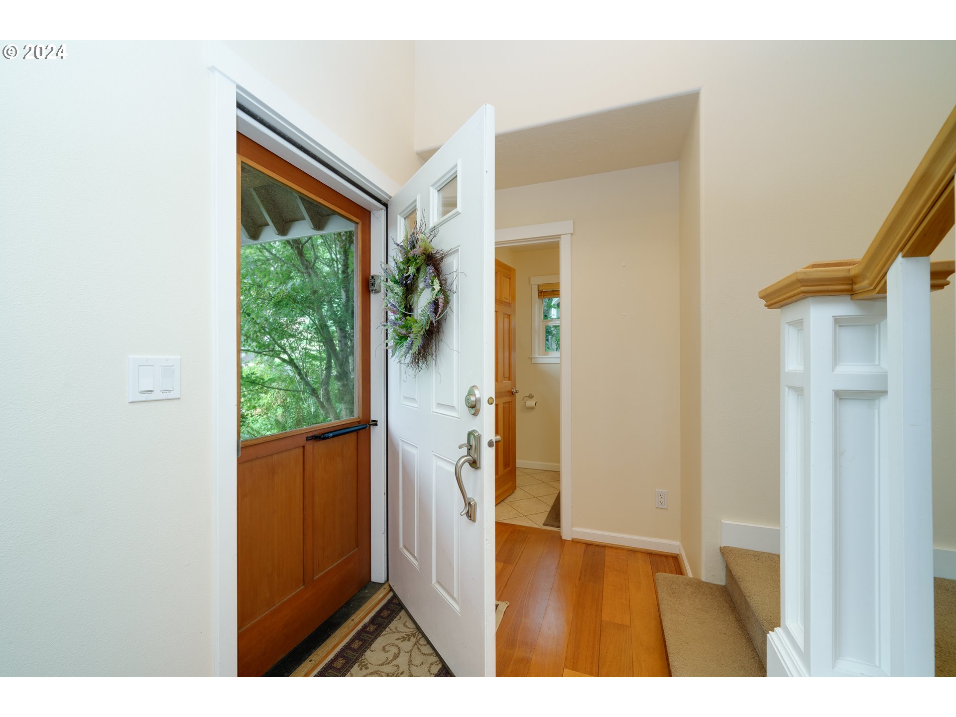 9355 Dewolf Road Nehalem, OR 97131 - Photo 3 of 33 a view of entryway and hall with wooden floor