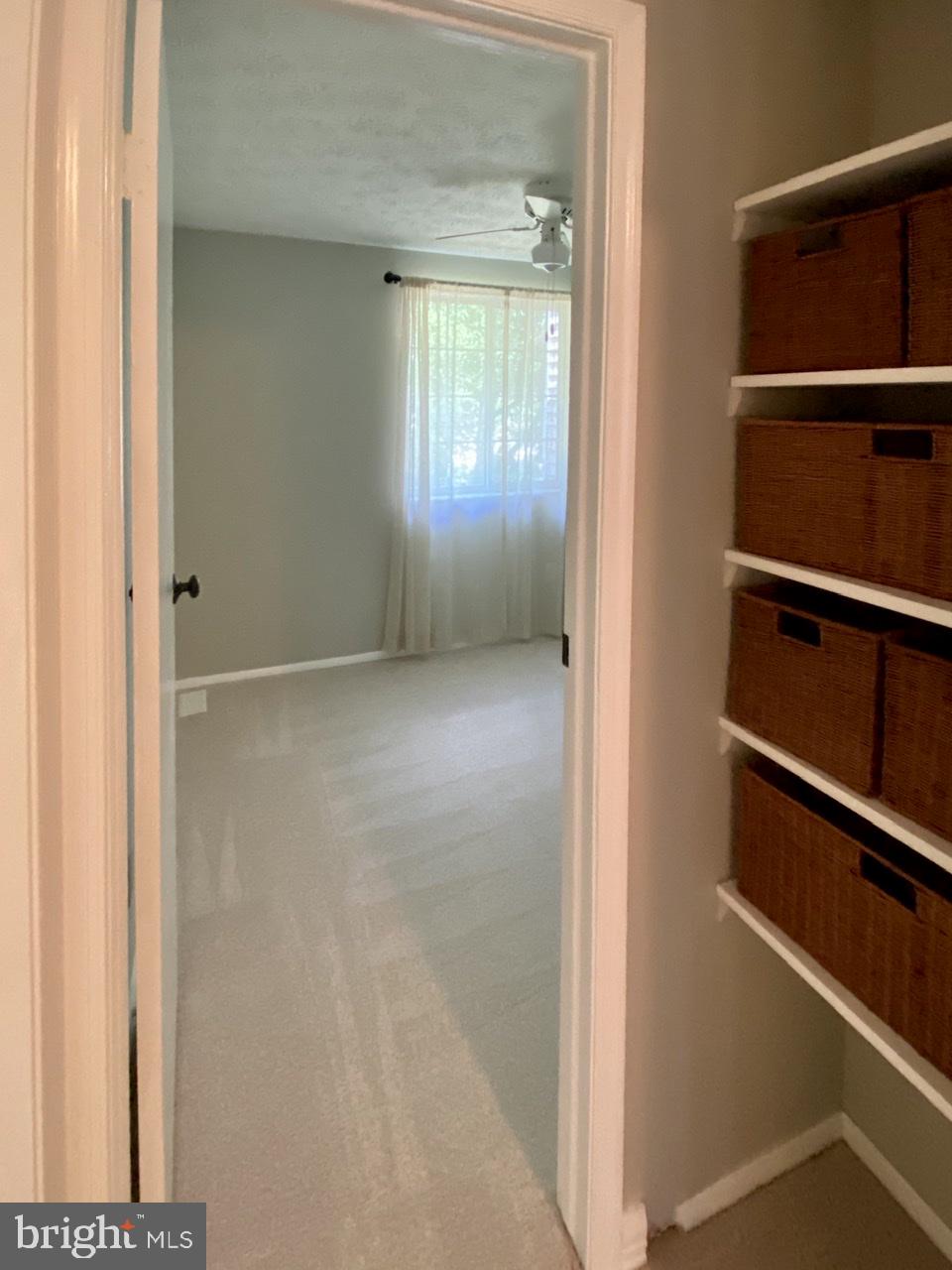 10964 Harpers Square Court Reston, VA 20191 - Photo 21 of 34 Upper level hallway linen "closet" into Bedroom #2