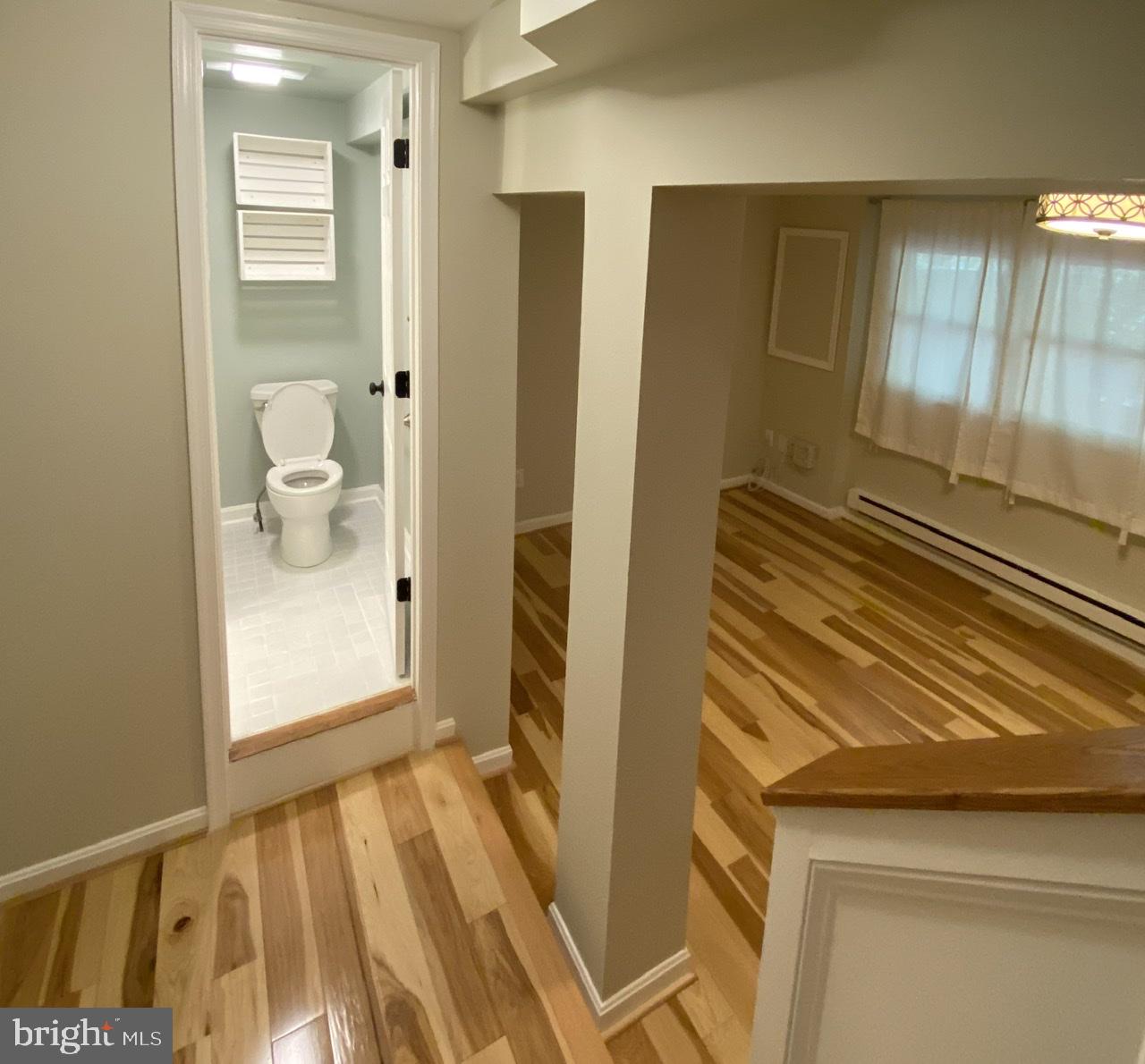 10964 Harpers Square Court Reston, VA 20191 - Photo 26 of 34 Lower level with hickory hardwood flooring