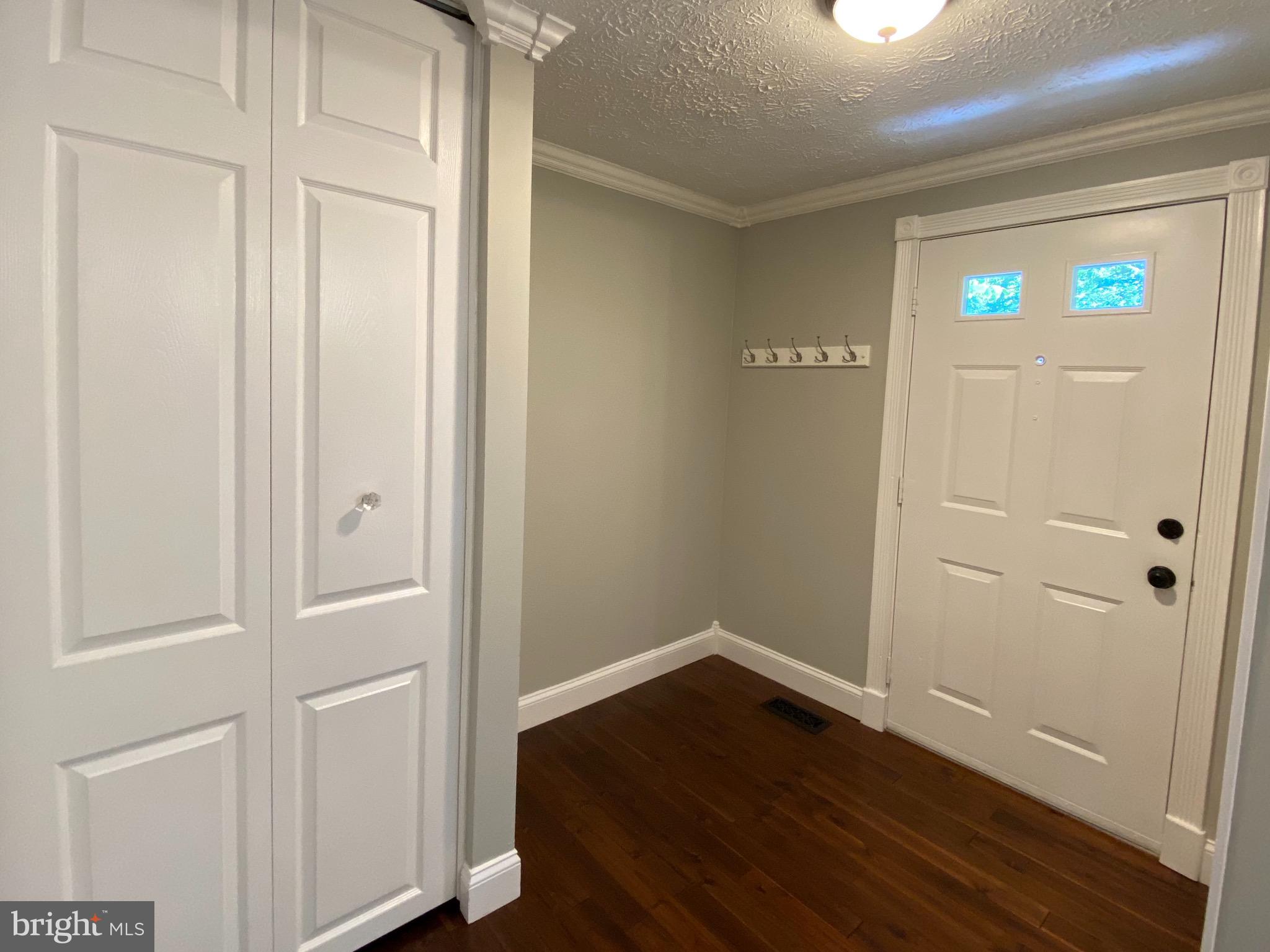 10964 Harpers Square Court Reston, VA 20191 - Photo 4 of 34 Inviting foyer with coat closet