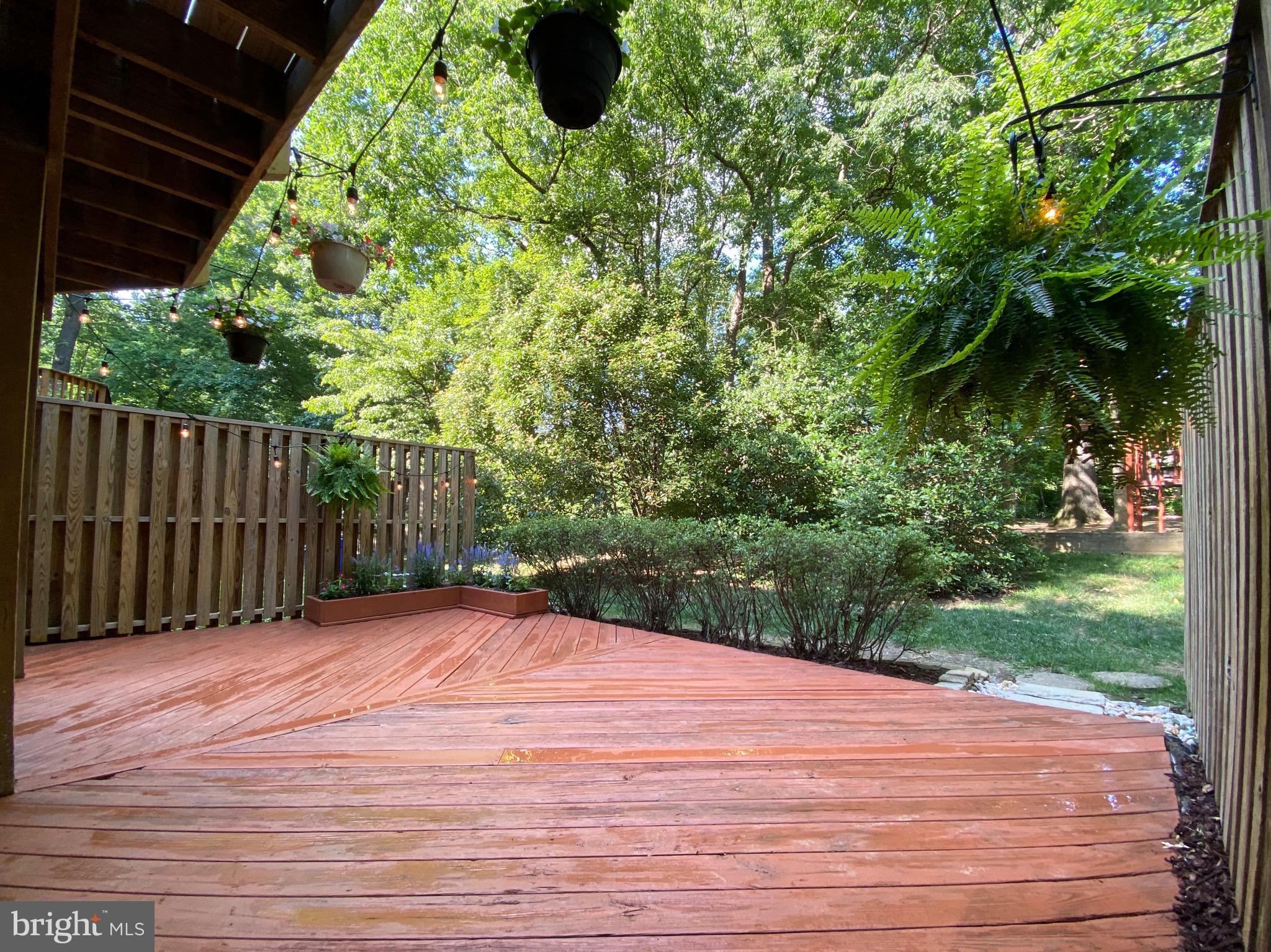 10964 Harpers Square Court Reston, VA 20191 - Photo 31 of 34 Tot lot is through the trees