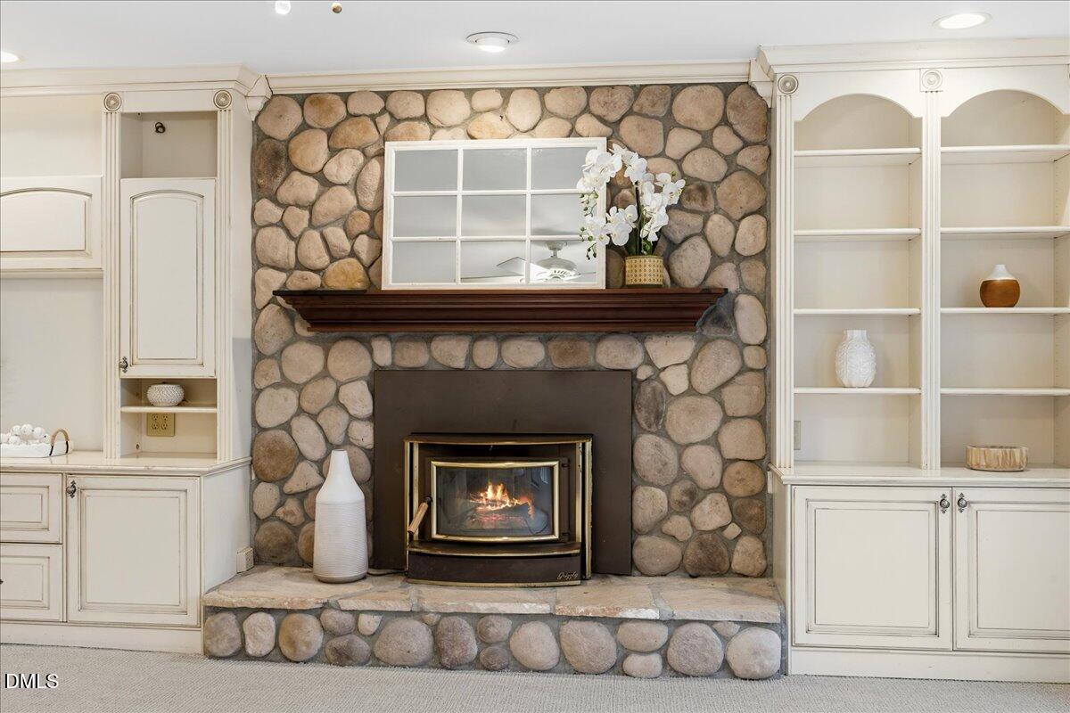 1603 Green Pine Court Raleigh, NC 27614 - Photo 21 of 70 a living room with a fireplace