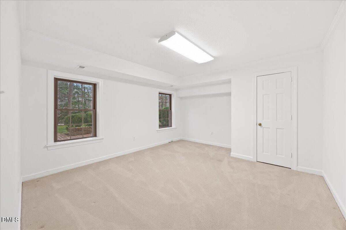 1603 Green Pine Court Raleigh, NC 27614 - Photo 50 of 70 an empty room with windows