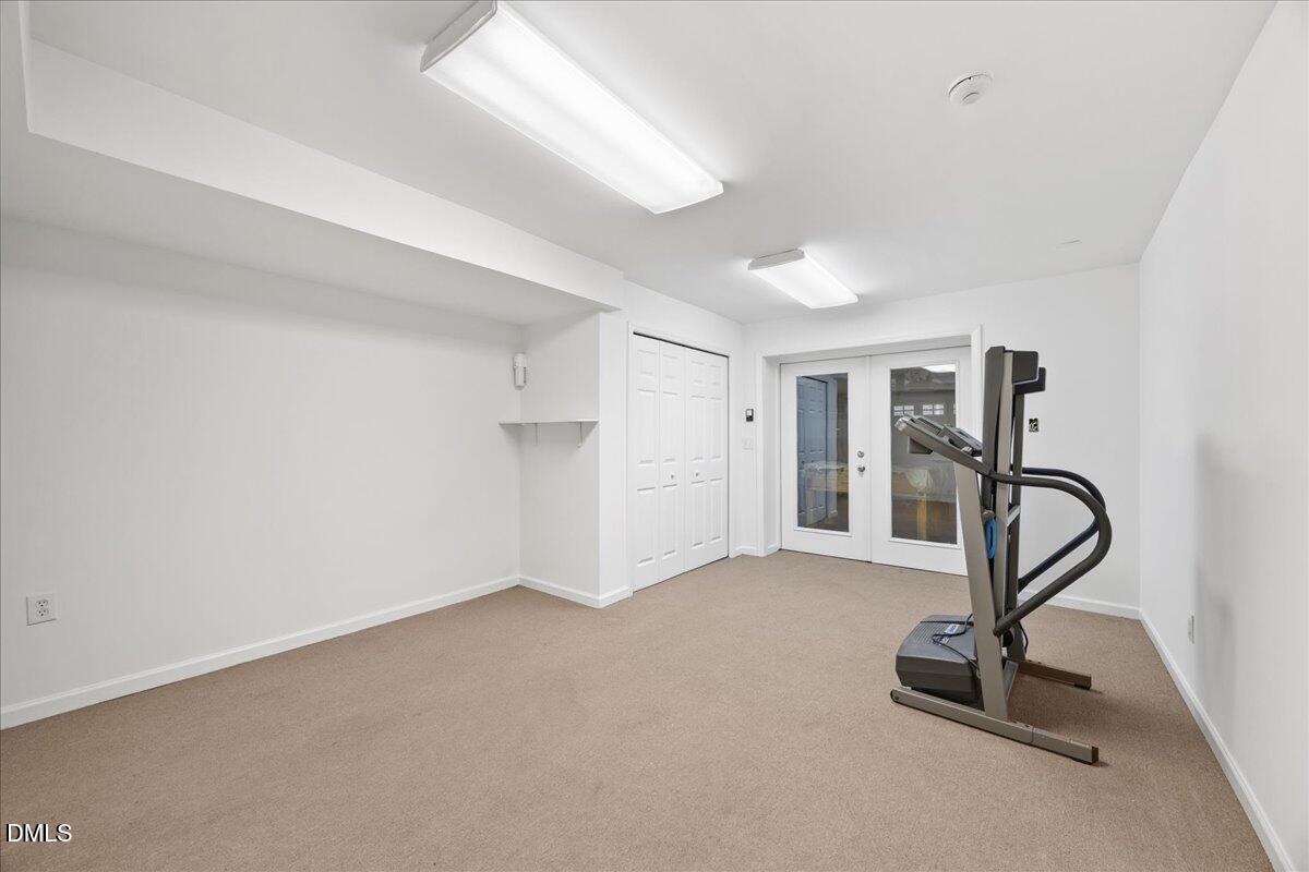 1603 Green Pine Court Raleigh, NC 27614 - Photo 54 of 70 a view of a room with gym equipment