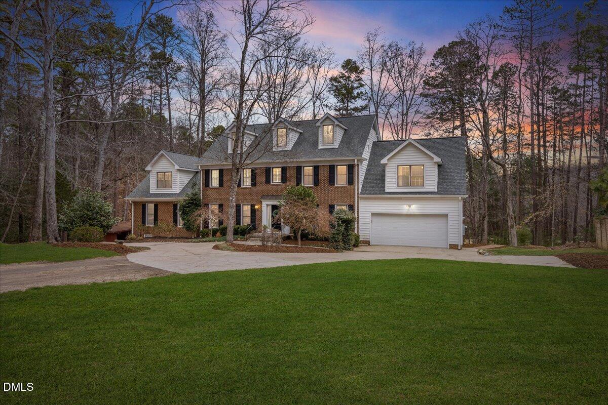 1603 Green Pine Court Raleigh, NC 27614 - Photo 70 of 70 a front view of a house with a garden and trees