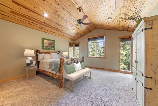 a bed room with furniture and a window